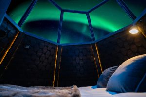 Glass-roofed Komsio Suite under the Aurora Borealis in Apukka Resort Rovaniemi Lapland Finland